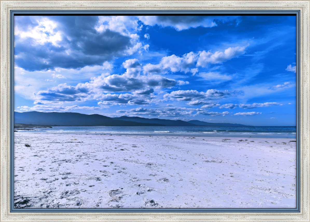 clouds rolling in above  the pristine white  sands and turquoise water, Suicide Beach, East Coast, Tasmania